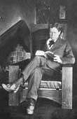 Portrait of Walter Burley Griffin in the Roy Lippincott house, Heidelberg, Victoria, c.1921, sitting in a couch designed by Griffin for Newman College, University of Melbourne. National Library of Australia PIC/9923 